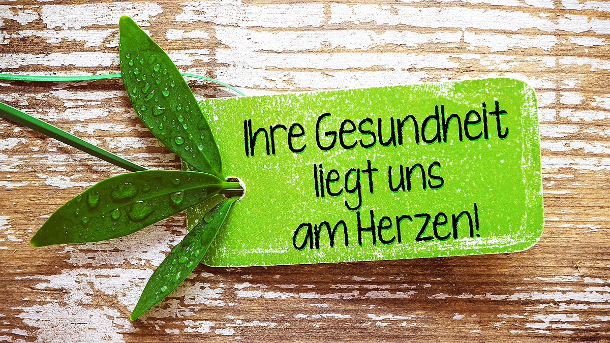 Grußkarte mit der Aufschrift Ihre Gesundheit liegt uns am Herzen